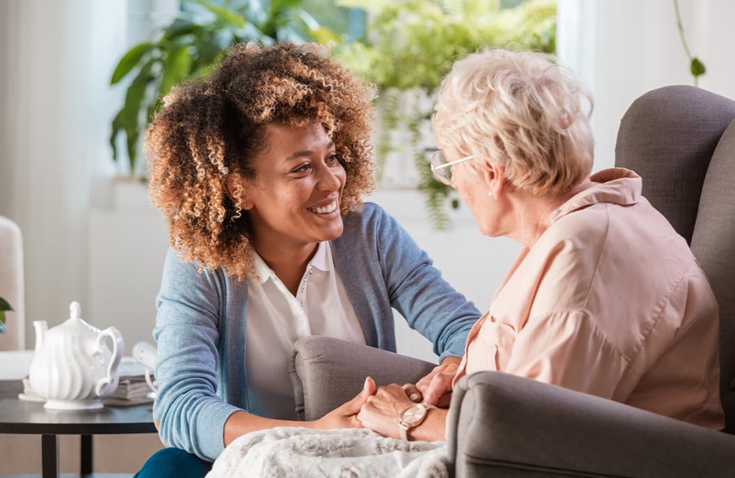 Carer looking after elderly resident